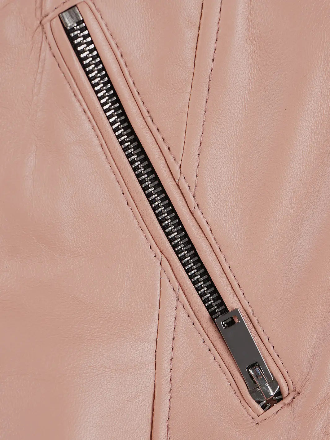 Close-up of a pink leather jacket with a zipper.